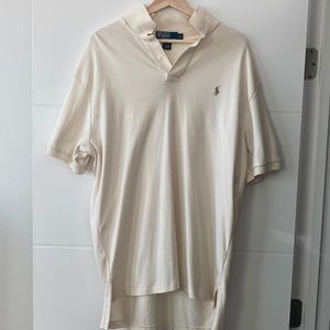 Polo shirt new never worn. The shirt is to long for me. Large has a small hole